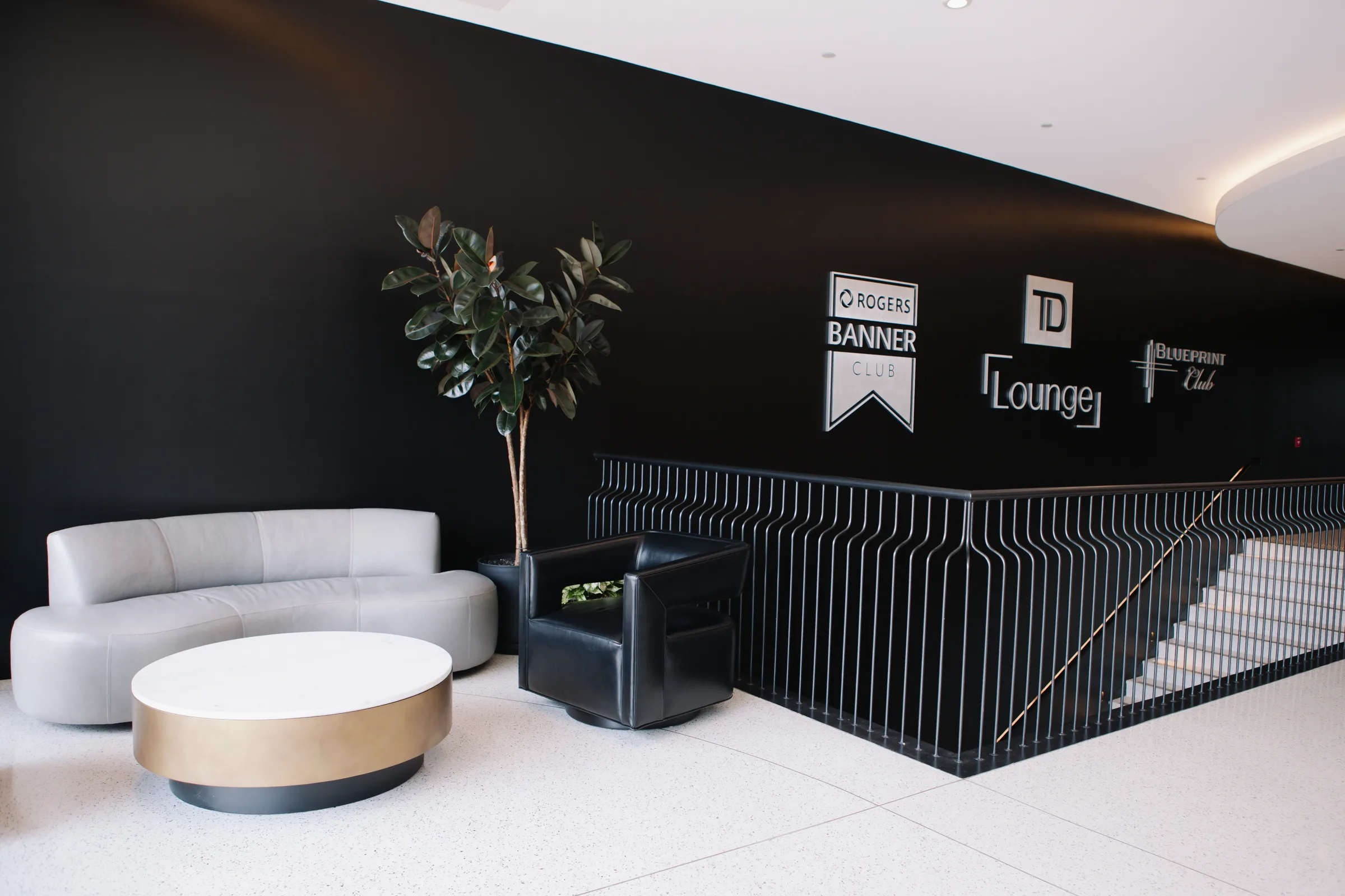 Elegant lobby with Rubber Plant and club signage at Rogers Centre Banner Club and TD Lounge